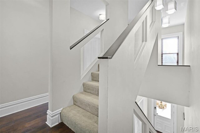 2835 Shenandoah Ave, Saint Louis, MO 63104 - staircase with wood finished floors and baseboards