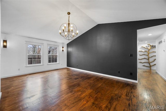 209 Hartland Ct, Hillsboro, MO 63050 - spare room with lofted ceiling, a chandelier, wood finished floors, and baseboards