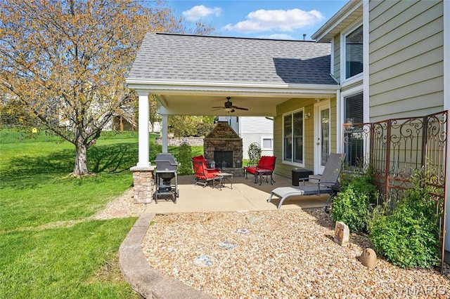 13456 Sunset Meadows Ln, Saint Louis, MO 63128 - view of patio featuring an outdoor stone fireplace and ceiling fan