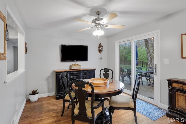 827 Yosemite Dr, Saint Louis, MO 63122 - dining space with wood finished floors, baseboards, and ceiling fan