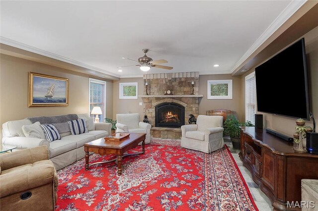 827 Yosemite Dr, Saint Louis, MO 63122 - living room featuring a ceiling fan, recessed lighting, crown molding, a stone fireplace, and light tile patterned floors