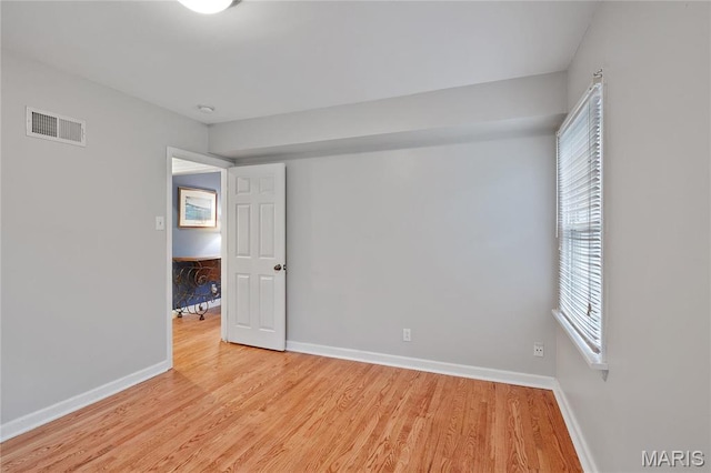 827 Yosemite Dr, Saint Louis, MO 63122 - empty room with light wood-style flooring and baseboards