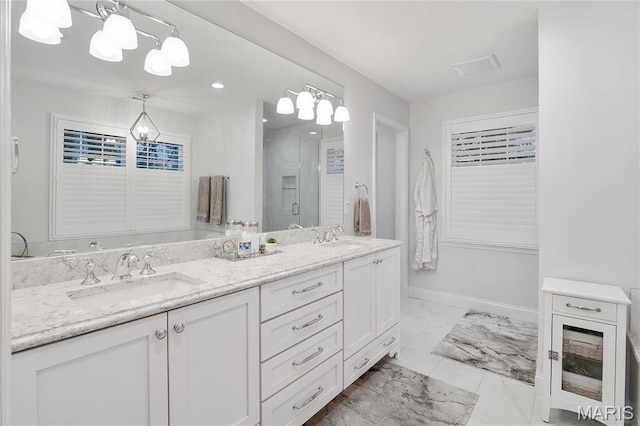 827 Yosemite Dr, Saint Louis, MO 63122 - bathroom with a stall shower, marble look tiles, a chandelier, baseboards, and double vanity