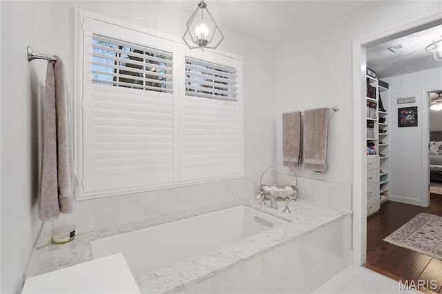 827 Yosemite Dr, Saint Louis, MO 63122 - full bath with a garden tub and a walk in closet