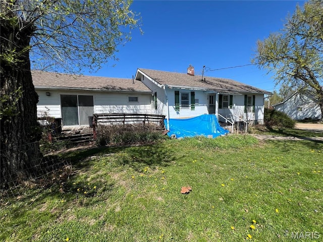 604 Salling St, Perry, MO 63462 - rear view of property featuring a lawn and a chimney