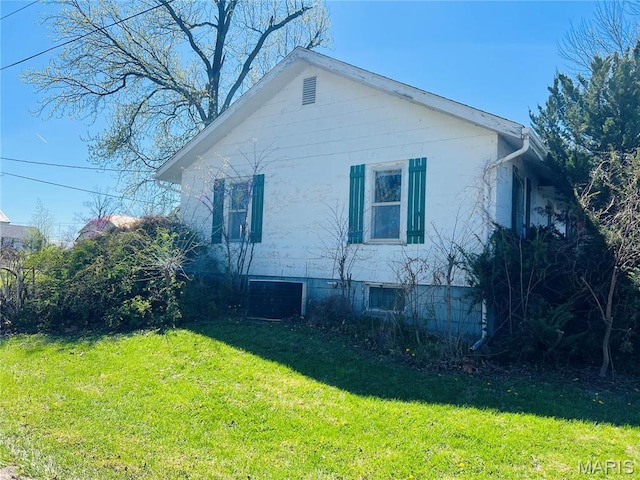 604 Salling St, Perry, MO 63462 - view of side of home featuring a yard and central AC unit
