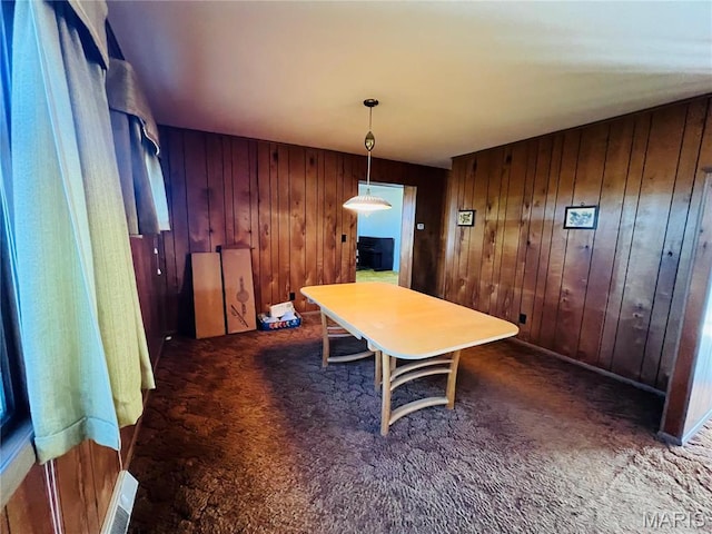 604 Salling St, Perry, MO 63462 - carpeted dining space featuring wooden walls