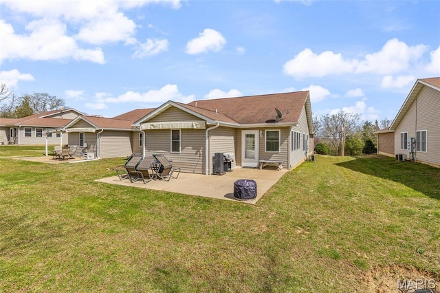 1654 Napoleon Dr, Bonne Terre, MO 63628 - rear view of property featuring a patio area, a lawn, and cooling unit