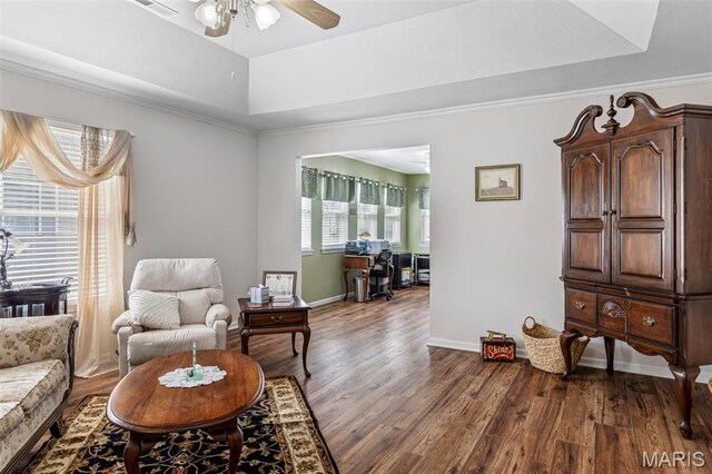 1654 Napoleon Dr, Bonne Terre, MO 63628 - sitting room with ceiling fan, dark wood-style flooring, a raised ceiling, baseboards, and ornamental molding