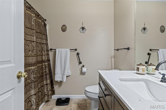 1654 Napoleon Dr, Bonne Terre, MO 63628 - bathroom with toilet, baseboards, vanity, tile patterned flooring, and a shower with curtain