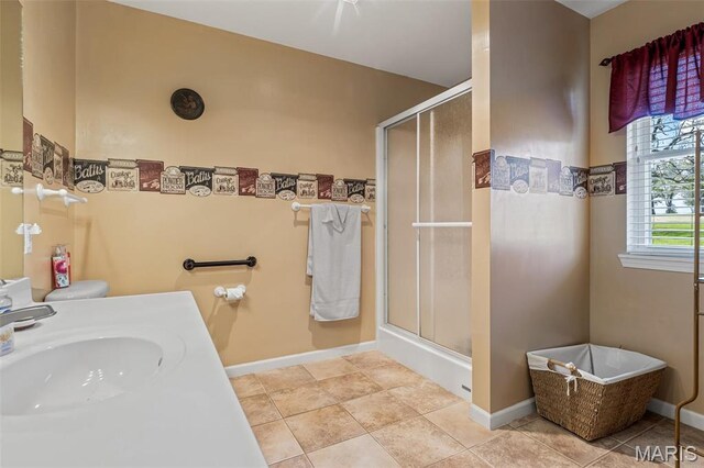 1654 Napoleon Dr, Bonne Terre, MO 63628 - full bathroom featuring a stall shower, vanity, and baseboards
