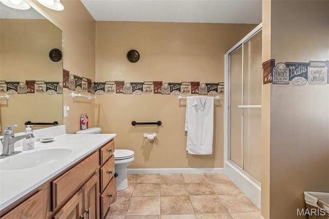 1654 Napoleon Dr, Bonne Terre, MO 63628 - bathroom with a shower with shower door, vanity, and toilet