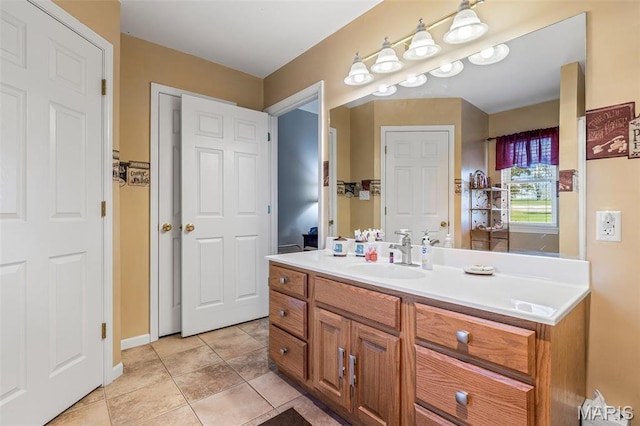 1654 Napoleon Dr, Bonne Terre, MO 63628 - bathroom with vanity, tile patterned flooring, and baseboards