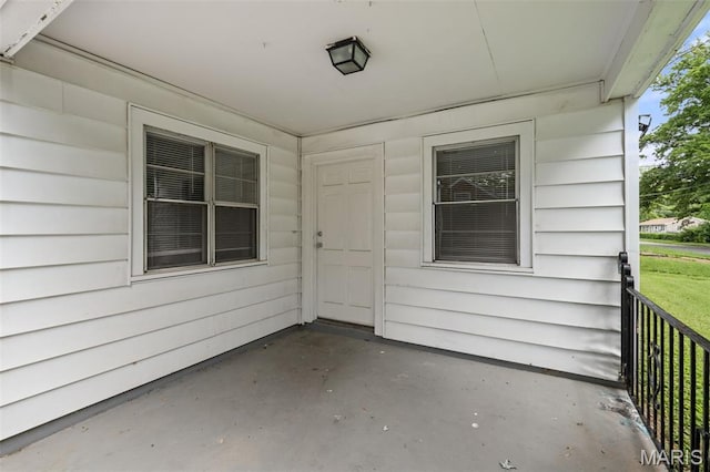 309 N Schlueter Ave, Saint Louis, MO 63135 - view of exterior entry featuring a patio