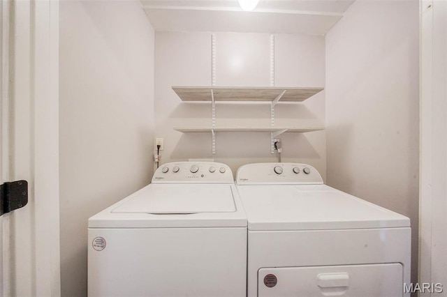 14056 State Route O, Rolla, MO 65401 - clothes washing area featuring washing machine and dryer