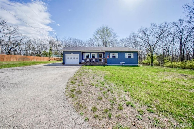 14056 State Route O, Rolla, MO 65401 - ranch-style house with an attached garage, driveway, and covered porch