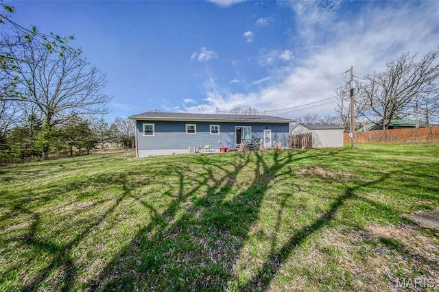 14056 State Route O, Rolla, MO 65401 - rear view of house featuring an outbuilding and a storage shed
