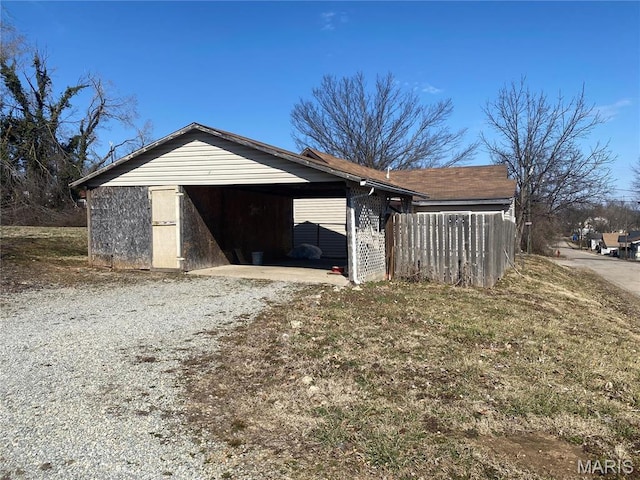 519 Albert St, Fredericktown, MO 63645 - garage with driveway and a carport