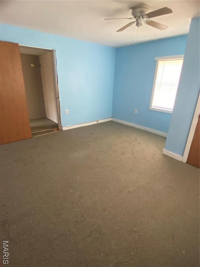 519 Albert St, Fredericktown, MO 63645 - unfurnished bedroom featuring carpet floors, baseboards, and ceiling fan