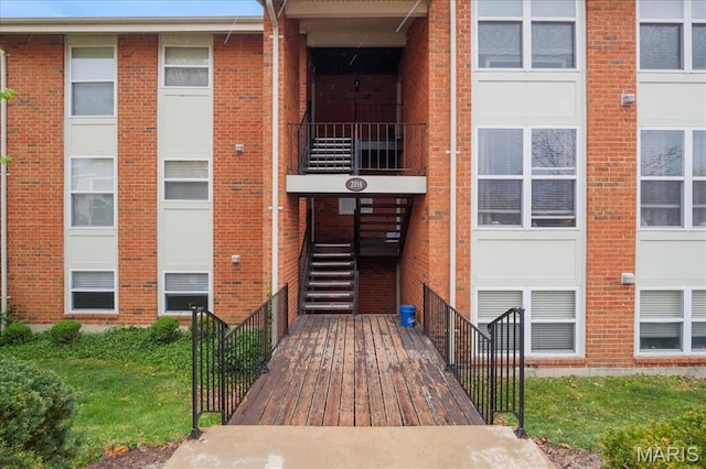 2014 Greenglen Dr Unit 101, Saint Louis, MO 63122 - view of building exterior featuring stairs and fence