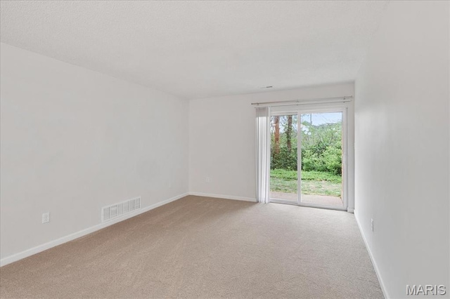 2014 Greenglen Dr Unit 101, Saint Louis, MO 63122 - empty room with carpet flooring and baseboards