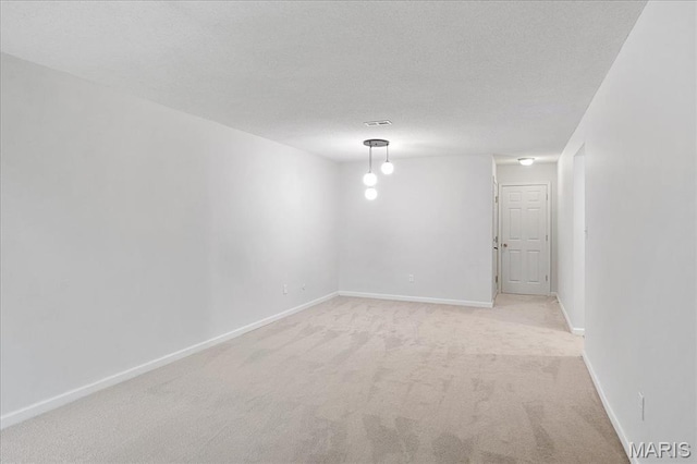 2014 Greenglen Dr Unit 101, Saint Louis, MO 63122 - empty room with light carpet and baseboards
