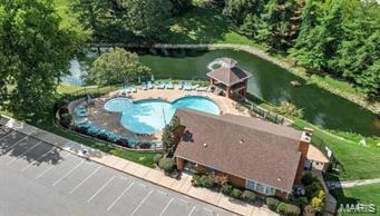 2014 Greenglen Dr Unit 101, Saint Louis, MO 63122 - drone / aerial view of a nearby body of water and a pool