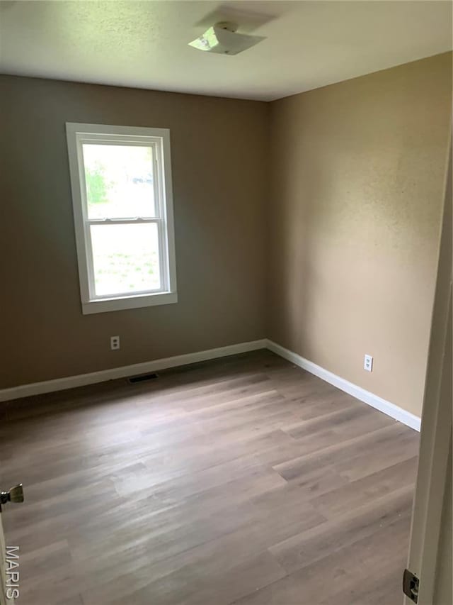 200 Easton St, Bonne Terre, MO 63628 - empty room with baseboards and wood finished floors
