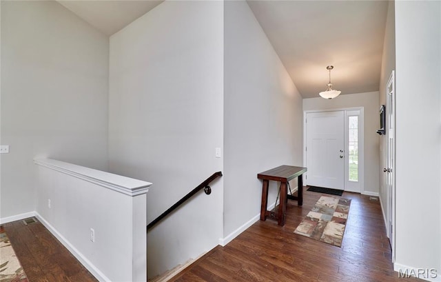 440 Winchester Way, Winfield, MO 63389 - entrance foyer with dark wood-style flooring and vaulted ceiling