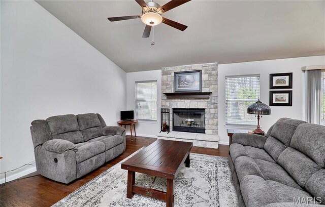 440 Winchester Way, Winfield, MO 63389 - living room with ceiling fan, lofted ceiling, wood finished floors, and a stone fireplace