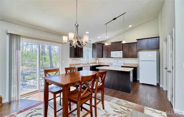 440 Winchester Way, Winfield, MO 63389 - dining space featuring a chandelier, vaulted ceiling, recessed lighting, and dark wood-type flooring