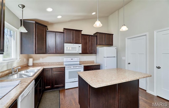 440 Winchester Way, Winfield, MO 63389 - kitchen with white appliances, dark brown cabinets, dark wood finished floors, high vaulted ceiling, and light countertops