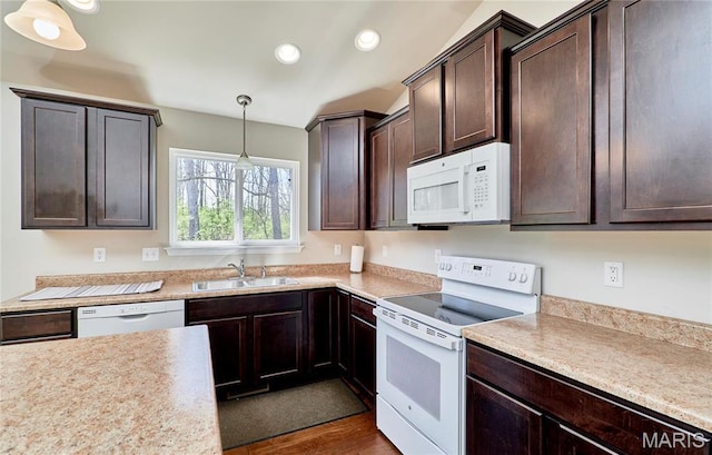 440 Winchester Way, Winfield, MO 63389 - kitchen with white appliances, dark brown cabinetry, light countertops, and recessed lighting
