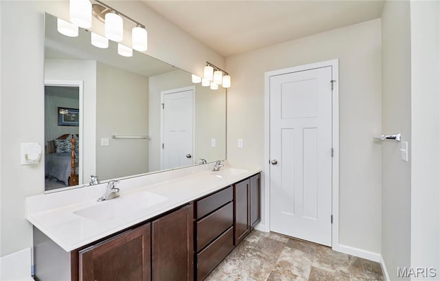 440 Winchester Way, Winfield, MO 63389 - bathroom with double vanity and stone finish flooring
