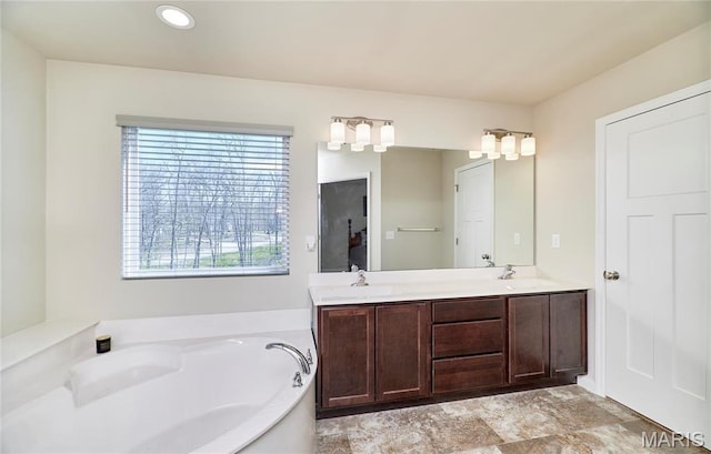 440 Winchester Way, Winfield, MO 63389 - full bath featuring a bath, double vanity, and recessed lighting