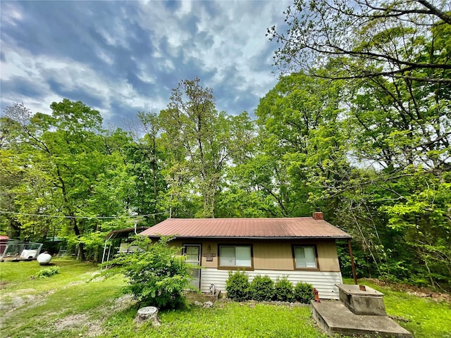 6405 Robin Ln, French Village, MO 63036 - view of front of house featuring a front lawn and metal roof