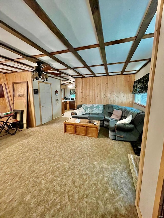 6405 Robin Ln, French Village, MO 63036 - living area with wooden walls, carpet flooring, and beamed ceiling