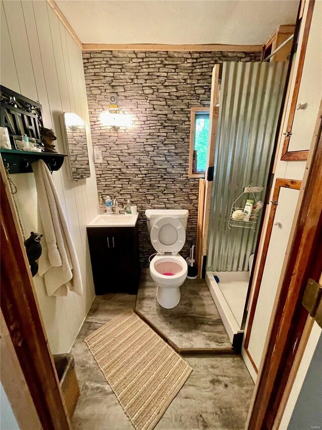 6405 Robin Ln, French Village, MO 63036 - full bathroom featuring a shower stall, toilet, concrete flooring, and vanity