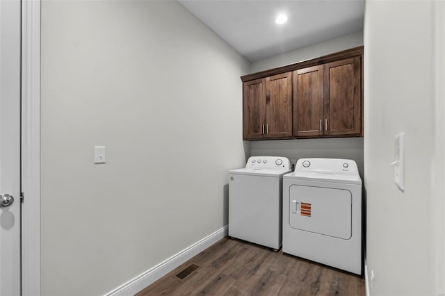 16 Creekside Way, Cape Girardeau, MO 63701 - laundry area featuring independent washer and dryer, cabinet space, dark wood-style floors, and baseboards