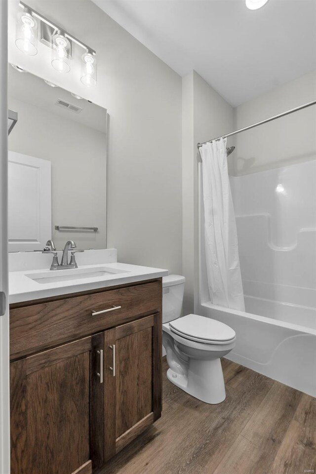16 Creekside Way, Cape Girardeau, MO 63701 - full bath with wood finished floors, toilet, vanity, and shower / bath combo