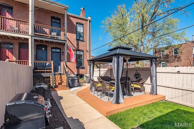 2712 Potomac St, Saint Louis, MO 63118 - view of patio with a gazebo, a balcony, area for grilling, and outdoor dining space