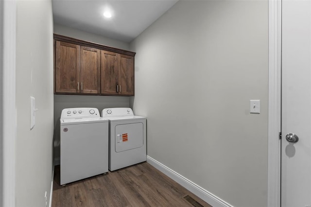 12 Creekside Way, Cape Girardeau, MO 63701 - washroom with independent washer and dryer, cabinet space, dark wood-type flooring, and baseboards