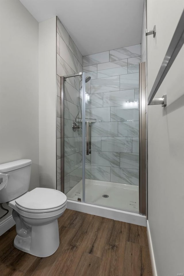 12 Creekside Way, Cape Girardeau, MO 63701 - full bath featuring toilet, a shower stall, and wood finished floors