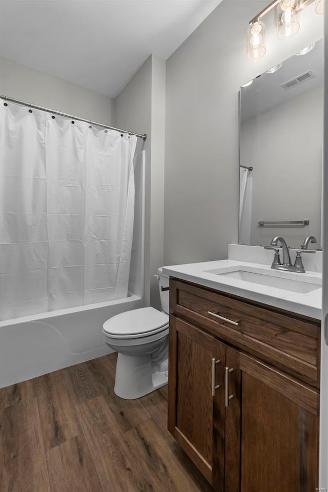 12 Creekside Way, Cape Girardeau, MO 63701 - full bathroom featuring wood finished floors, toilet, vanity, and shower / bath combo