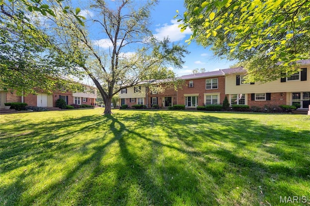 13355 Land O Woods Dr, Saint Louis, MO 63141 - view of front facade featuring brick siding and a front yard