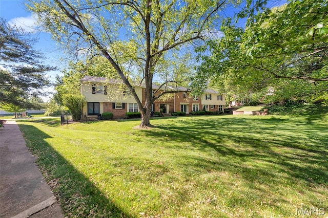 13355 Land O Woods Dr, Saint Louis, MO 63141 - view of front of home with a front lawn and brick siding