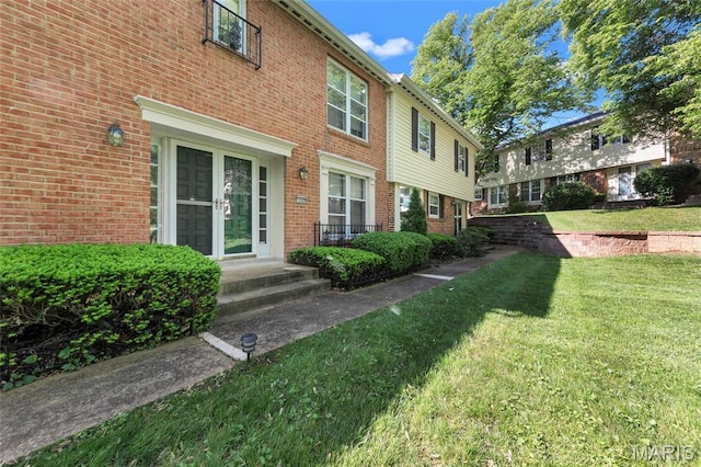 13355 Land O Woods Dr, Saint Louis, MO 63141 - view of side of home with a lawn and brick siding