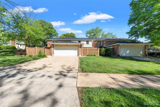 13355 Land O Woods Dr, Saint Louis, MO 63141 - single story home with brick siding, an attached garage, and concrete driveway
