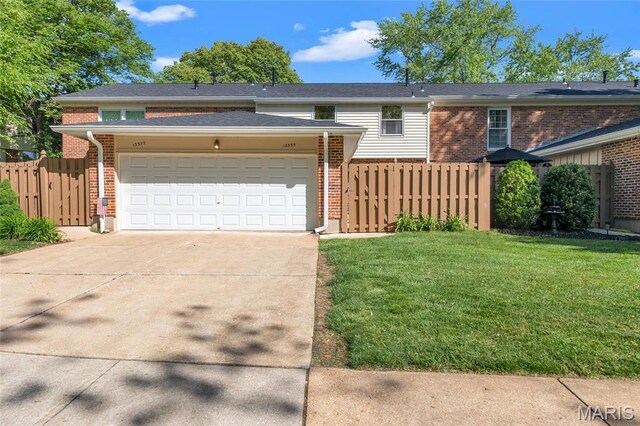 13355 Land O Woods Dr, Saint Louis, MO 63141 - view of front facade featuring brick siding, concrete driveway, and a garage