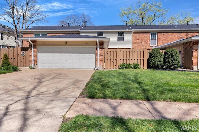 13355 Land O Woods Dr, Saint Louis, MO 63141 - view of front of home featuring brick siding, a garage, driveway, and a gate